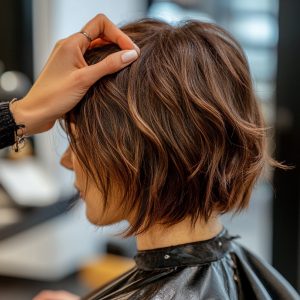 stylist-creating-trendy-shag-haircut-with-textured-layers